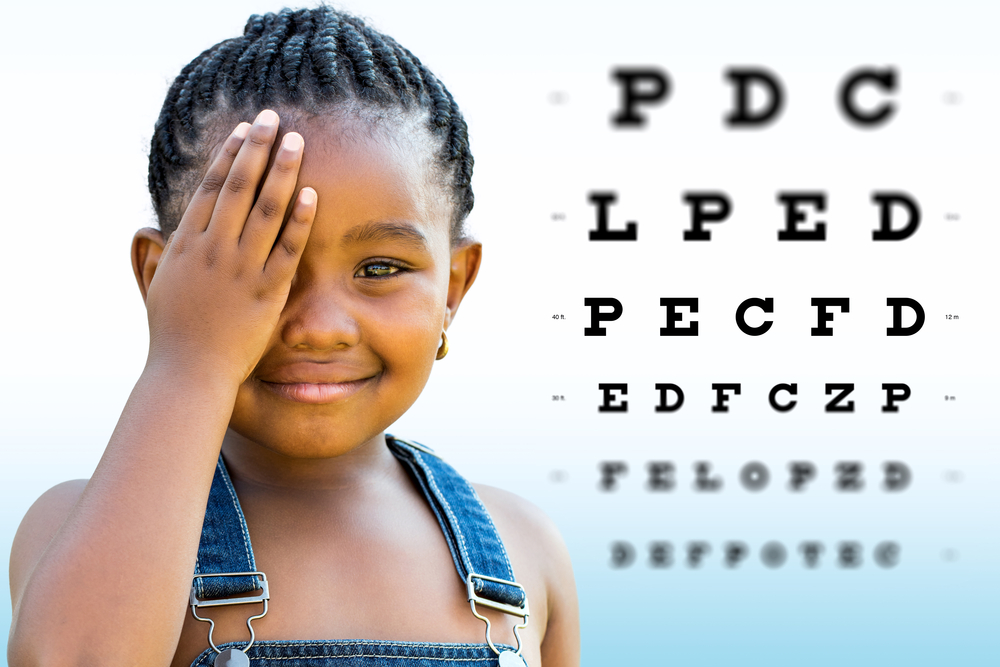 Close,Up,Face,Shot,Of,Little,African,Girl,Testing,Vision.